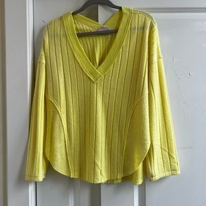 Out from under sweater shirt